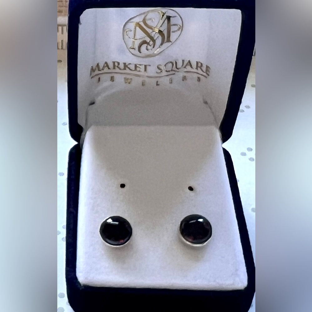 Garnet stud earrings in silver